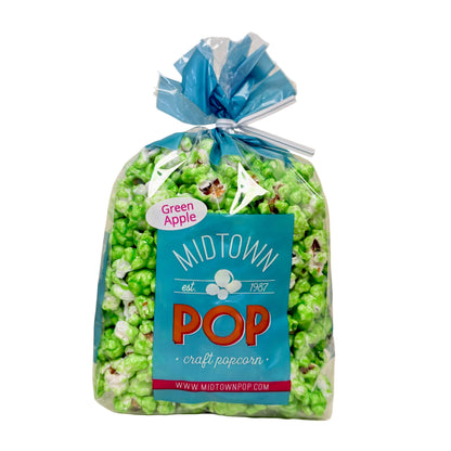 Bag of green apple popcorn and 'Midtown Pop' autumn popcorn, apple flavor